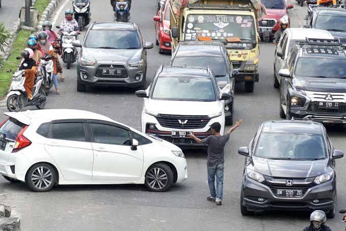 Pak Ogah Menjamur di Pekanbaru, Dishub Minta Pengendara Tak Beri Uang