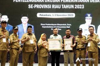 Komitmen Membangun Desa, Plt Bupati Kepulauan Meranti Terima Tiga Penghargaan Sekaligus