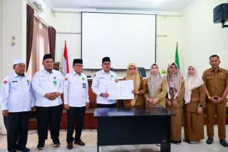 DP3APM Pekanbaru dan Kemenag Teken MoU Evaluasi tentang Kota Layak Anak